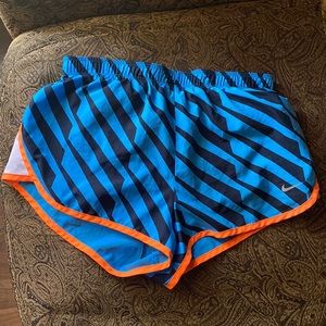 Nike baby blue and orange running shorts